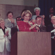 Photo was taken at a public event in Washington DC sometime between 1992 to 1995 when Hillary Clinton was trying to pass national health insurance legislation. Her enemies named it "